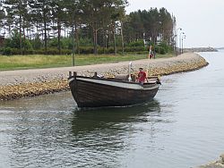 Ein Norweger mit seinem Boot